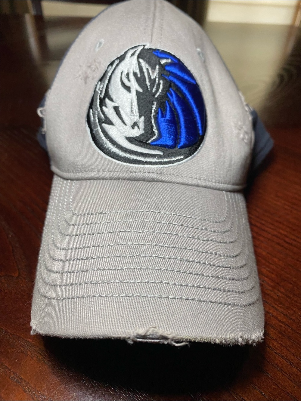 Dallas Maverick’s Gray/Blue Top of the World one fit cap, distressed